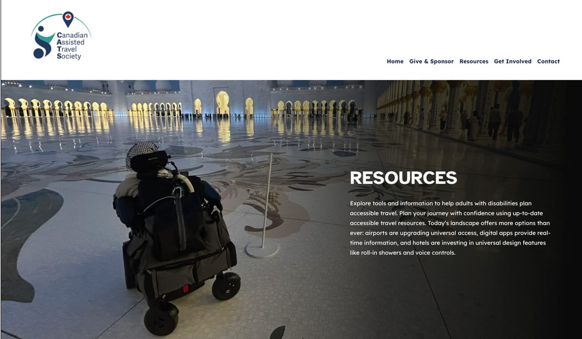 Person in a power wheelchair visiting the courtyard of a mosque