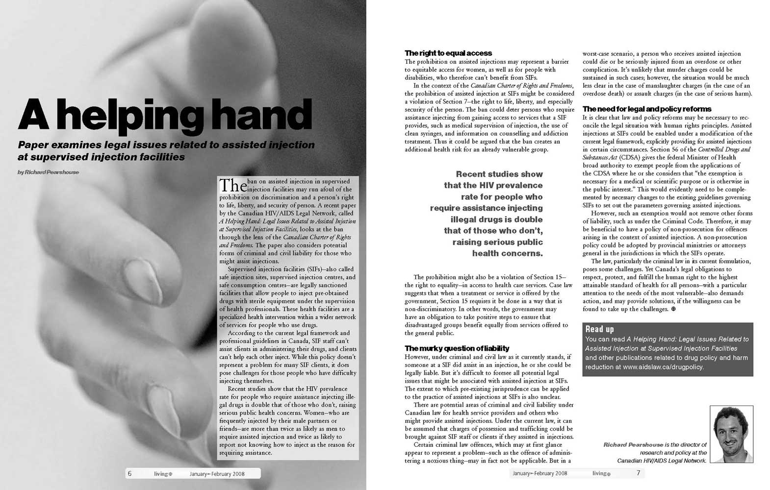 HandSpread Magazine spread from Living+. A black-and-white photo of a hand opening, with the headline "A helping hand" and a two-column article beside it on legal issues around supervised injection facilities.
